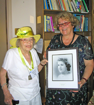 Jan Weisblat and Nicole Vaget with Sylvia's Yearbook Photo (Courtesy of Mary Fanelli/Mount Holyoke French Department)